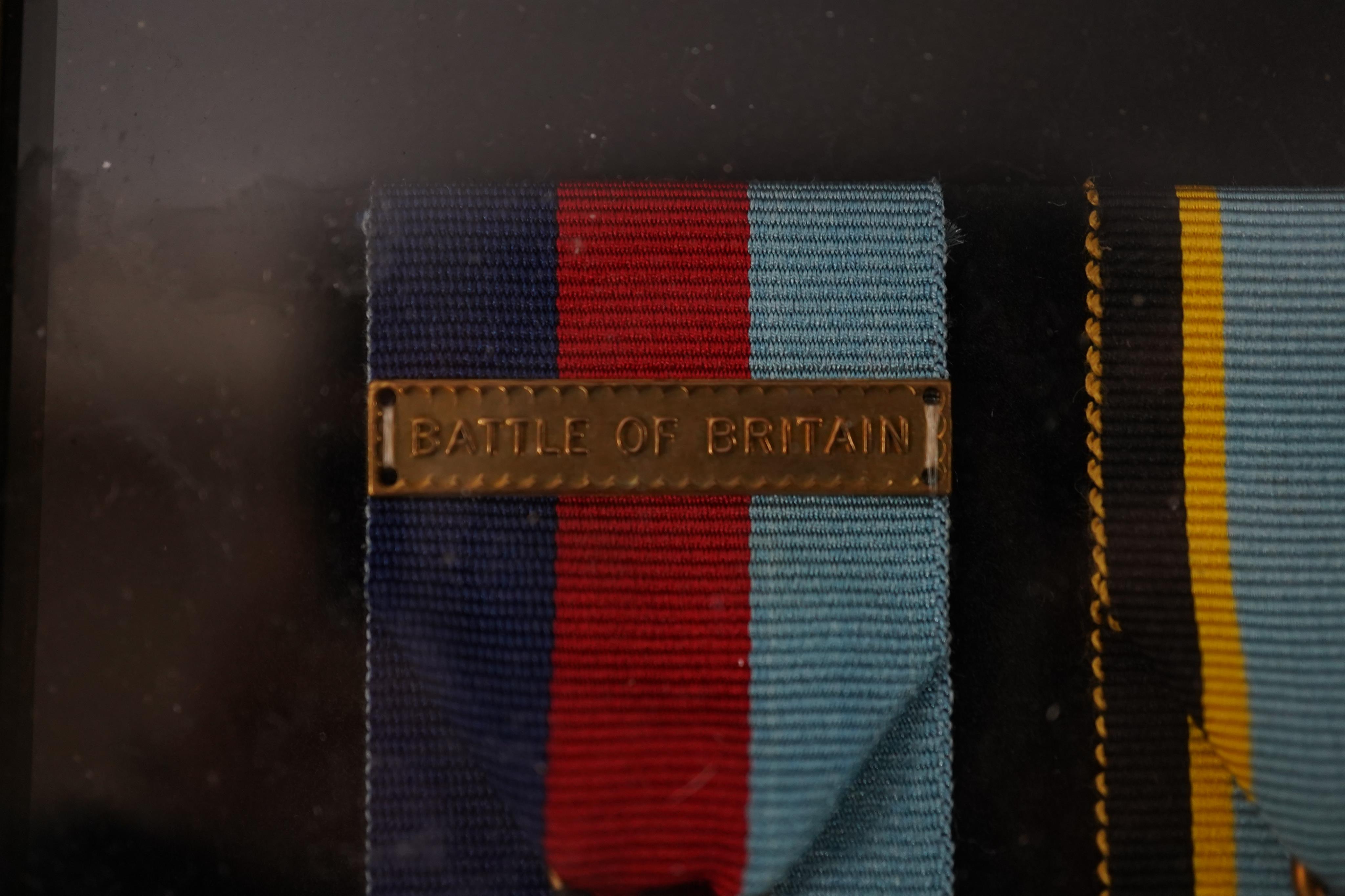 A framed WWII RAF medal group awarded to Wing Commander Brian Robert Noble, comprising;, The 1939-1945 Star, with clasp for the Battle of Britain, The Air Crew Europe Star, The Defence Medal, The British War Medal, The 1